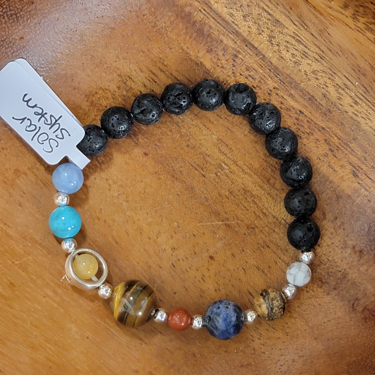 Gemstone and lava solar system bracelet